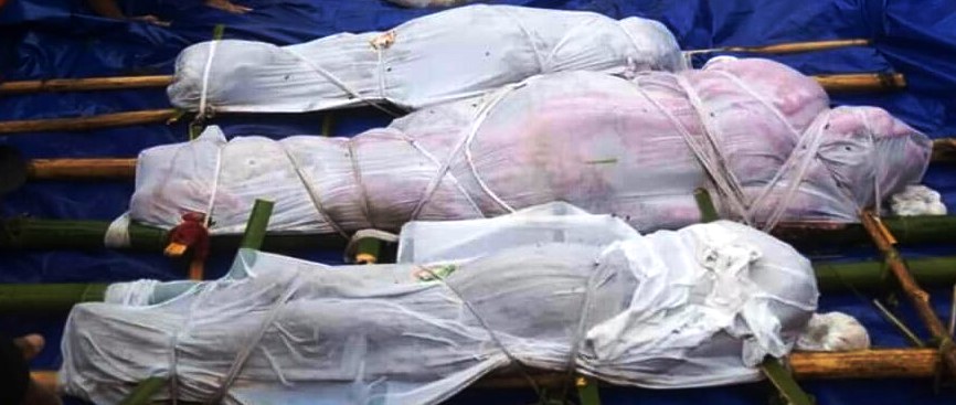 Nine people, including eight men and a girl, were found dead today